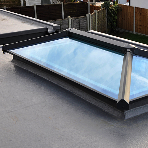 Glass roof lantern in flat roof. New build house